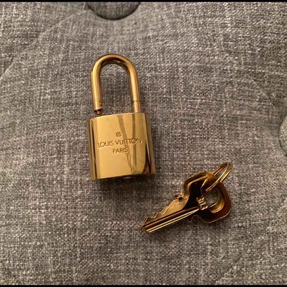 Authentic Louis Vuitton Gold Lock and Key.